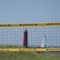 Catch the light by a beach volleyball net