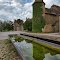 Bonnay : le château et son reflet sur l'eau de l'abreuvoir