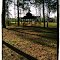The sun sets behind the little gazebo in the woodsy grove of trees across the street from the house. Sure, it's not a 500 acre nature park but it isn't your father's suburbia either. Most developers in the past obliterated every indicator of nature and crammed 400 houses where 100 would have been more livable. Just another reason for the housing catastrophe in the US.