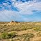 Viewing south-westerly across the Powell Valley toward the McCullough Peaks, Absaroka Range, and Heart Mountain, from alongside Park Co. Lane 5 just west of its intersection with Wyoming State Hwy. 114. Powell, Wyoming