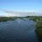 Looking upstream, south-westerly, at the Wind River from the Wyoming State Hwy. 789 bridge. Riverton, Wyoming
