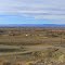 Looking west-south-westerly across Airport Rd. and U.S. Hwy. 26 towards the Wind River Range. Riverton, Wyoming
