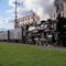 NKP 765 passing Woodard Furniture Company Building, Owosso, MI, October 2011