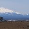 Douglas DC-7s / hangar (Madras Municipal Airport - MDJ) & Cascade Range / Mt. (Volcano) Jefferson (background) - Madras, OR, USA.