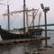 Sailing Replicas at dock with Great River Bridge in background