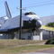 The space shuttle in the entrance to the Astronaut Hall of Fame.