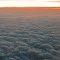 Sunrise Over the Clouds