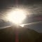 sun over mountains