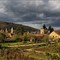 DAGLAN [24] - vue depuis les jardins avec un ciel menaçant (avril  2008)
