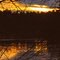 le soir couchant sur le lac gelé