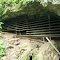 McDowell Cave bat gate under costruction.  The gate is 81 feet wide and protects a gray bat maternity colony. Lake of the Ozarks State Park.