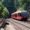BLS-RABe 526 282 als Regionalzug Solothurn-Sonceboz via Moutier bei der Einfahrt in Gänsbrunnen am 29.6.2010, im Hintergrund das Nordportal des Weissensteintunnels