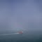 Red Fishing Boat in Fog