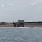 West Branch State Park dam and gate structure with boat.