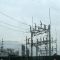 Electric Transfer Station with plane on approach to IND