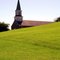 Rock Church and grassy hill