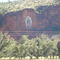 La Virgen carretera Santana-Magdalena (Virgin Mary painting on the side of a mountain highway Santana - Magdalena Sonora Mexico