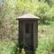 Looks like a concrete phone booth, on the Willard Munger bike trail