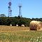 Hay bales (part 4), with towers watching