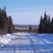 Half-plowed stretch along Hickel Highway