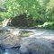 Broken stone dam along Eno River