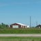 Red barn before Steele