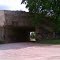 Road under railroad tracks on West A at W 112th