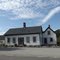 At one time, it appears this farm had a school building attached to it.  Does any one know any more about this structure?