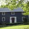 Gray house. White trim.