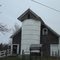 Wooden silo on a barn.