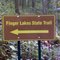 FLT M30 18.5 mi - Metal FLT sign, probably made and erected by landowner