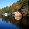 Boat House on Sixth Lake with Fall Foliage - Adirondacks
