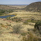 The City of Denver on the horizon, Mount Glennon on the right, Dakota Ridge on the left, the Town of Morrison and the parking lot for East Mount Falcon