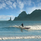 Wainui Beach with Tuahine Point lighthouse behind