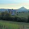 Grain elevators in Dufur, Oregon, with Mt. Hood in distance