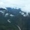 Endless Winding Rivers through Southern Highland Mountains Covered in Thick Jungle and Damp Moss below, in PNG,
