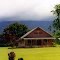 UBILI UNITED CHURCH  near Ulamona Village, with the tall slopes of Mt ULAWUN Volcano behind in WNBP, PNG, on 10-11-2000