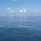 Clouds reflected in a pacific Pacific