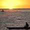 Hawaii Sunset and kayak, Molokai Harbor (photo by Rose Braverman, Molokai)