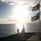 American Flag and Hawaiian State Flag with the sun setting  [HD]