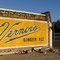 old Vernor's Ginger Ale paint ad, uncovered during demolition (note the old GArfield exchange telephone number)