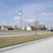 old farmhouse with Alerus Center looming in the background, 42nd St, Grand Forks
