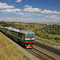 Diesel locomotive TEP70-0341 with train