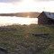 Sauna buildings next to lake