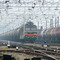 Electric locomotive VL80S-3003 with train on the train station Kiziterinka