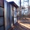 ramshackle tin shed outbuilding amongst the trees behind the EnWood Structures plant, 12-15-10