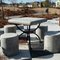 attractively designed checkers/chess table, set on a  stylized checker/chessboard-patterned patio in the Carolina Preserve development, contrasting dramatically with the adjacent red brick, fresh pine straw, dormant bermudagrass, and Carolina blue sky, 12-28-11