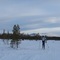 Cross-country skiing by snowmobile track in Lovozero area in end of April