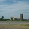 Patched up barn and silo