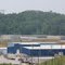 Oconee Nuclear Station spent nuclear fuel storage in distance